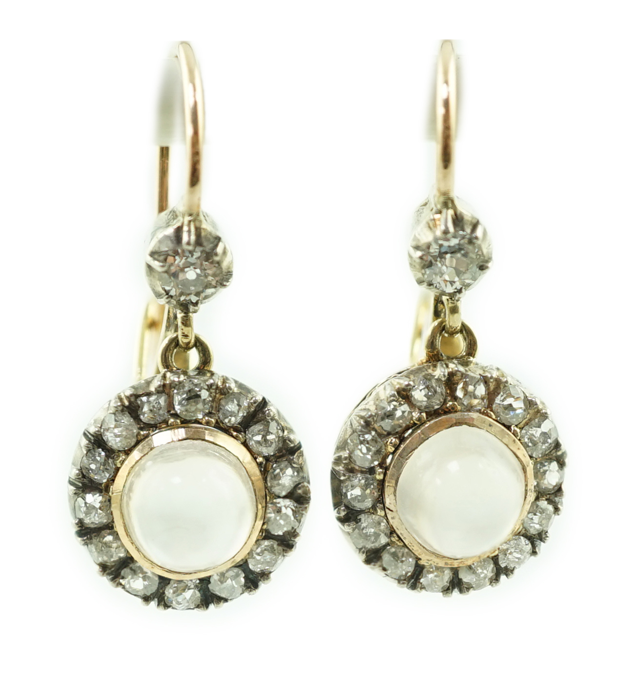 A pair of early 20th century gold, moonstone and old round cut diamond set cluster drop earrings